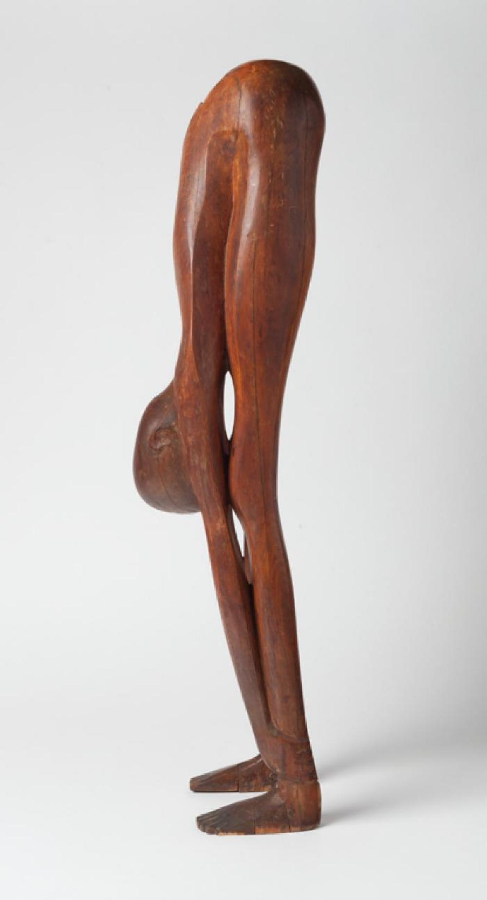 Boy Looking through Legs, image 11