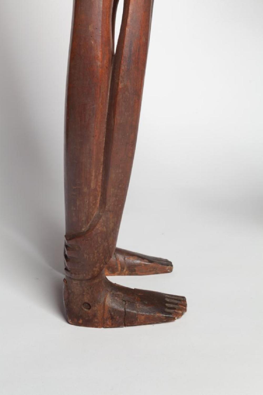 Boy Looking through Legs, image 7