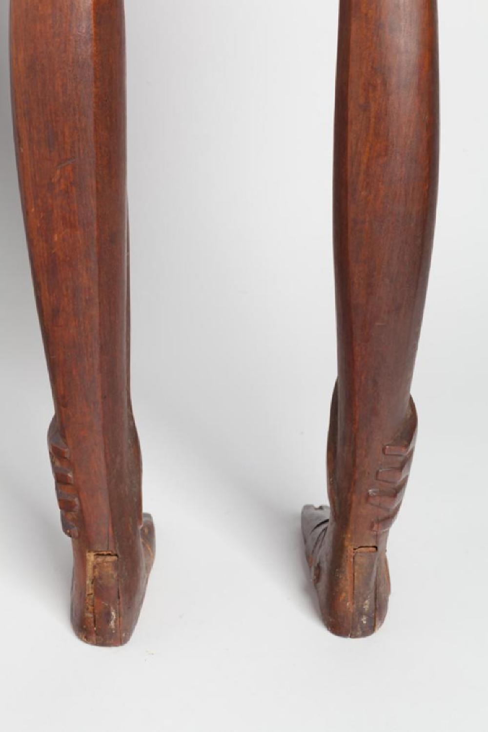 Boy Looking through Legs, image 5