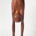 Thumbnail: Boy Looking through Legs, image 13