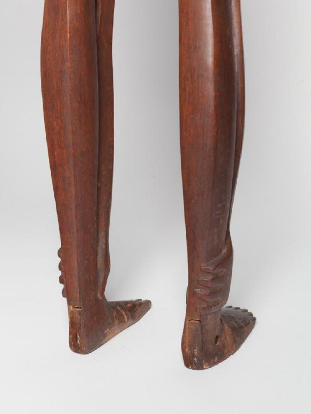 Boy Looking through Legs, image 4