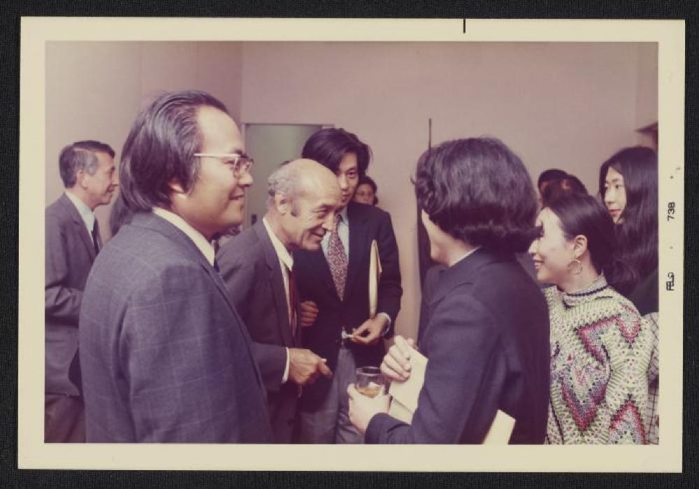 Noguchi with guests at exhibition opening, Minami Gallery, 1973