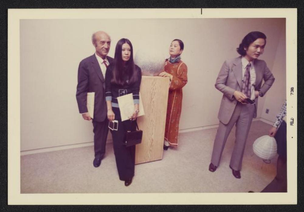 Noguchi with guests at exhibition opening, Minami Gallery, 1973