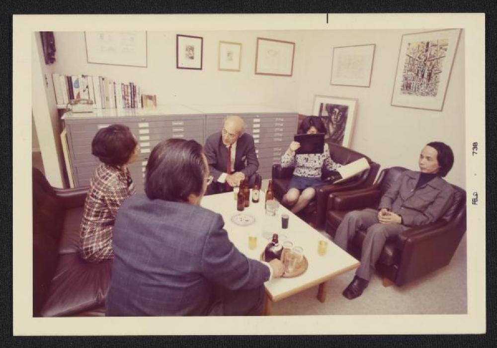 Noguchi with Tōru Takemitsu and guests at exhibition opening, Minami Gallery, 1973