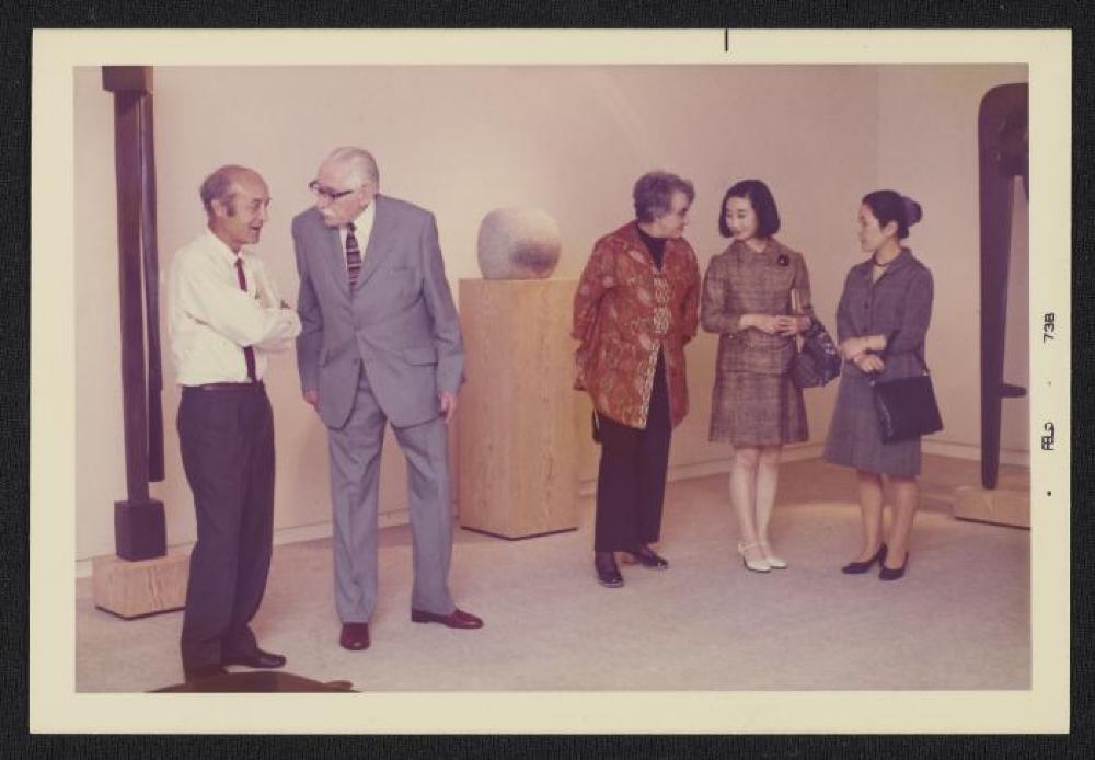 Noguchi with Bernard Leach, Janet Leach Mihoko Okamura and guests at exhibition opening, Minami Gallery, 1973
