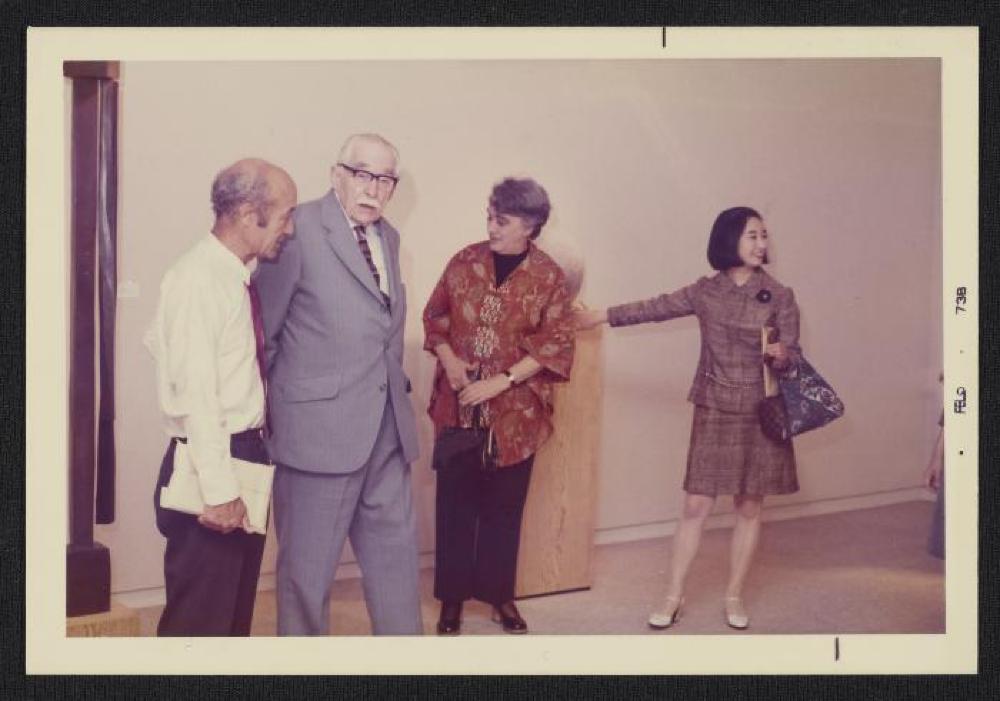 Noguchi with Noguchi with Bernard Leach, Janet Leach and Mihoko Okamura at exhibition opening, Minami Gallery, 1973 