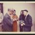 Noguchi with Michio Noguchi (beret) at exhibition opening, Minami Gallery, 1973