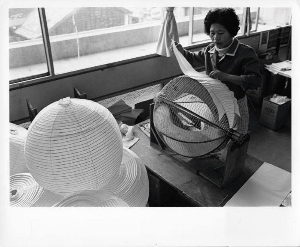 Worker at Ozeki Factory constructing Akari