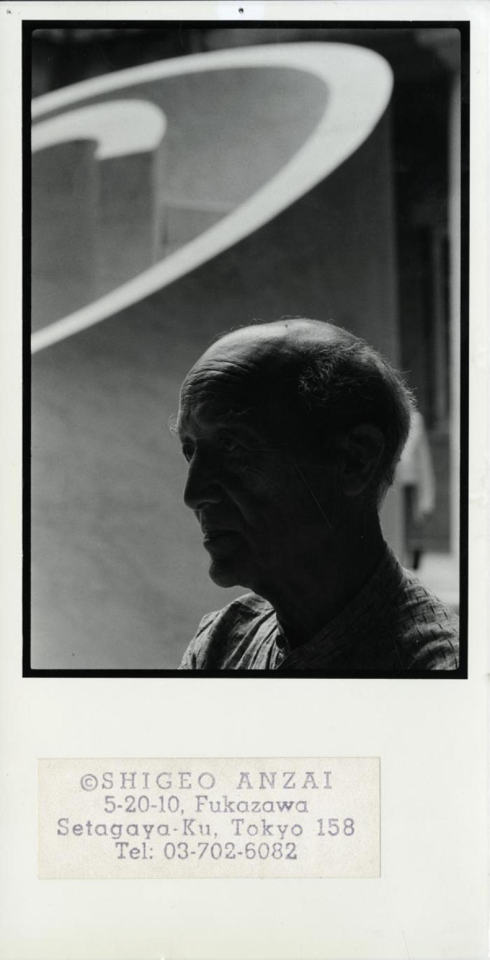 Noguchi in front of Slide Mantra at "Isamu Noguchi:  What is Sculpture?," 1986 Venice Biennale, June 29, 1986 - September 28, 1986.