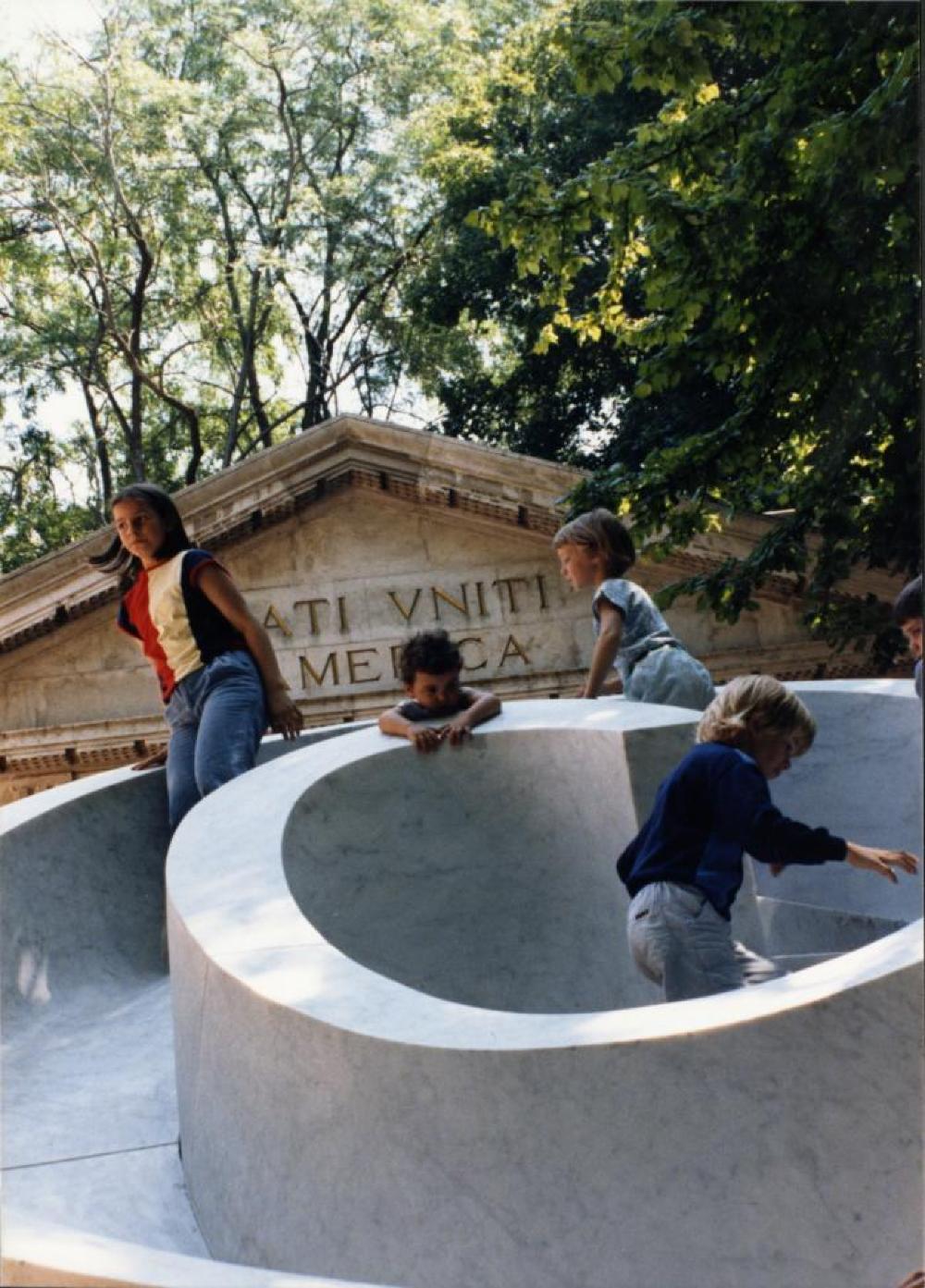 Children playing on Slide Mantra at "Isamu Noguchi:  What is Sculpture?," 1986 Venice Biennale, June 29, 1986 - September 28, 1986.