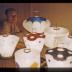 Installation view of Akari: Lamps by Isamu Noguchi, with Isamu Noguchi at Chuo Koron Gallery, Japan