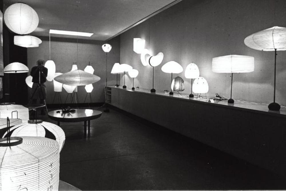Installation view of "Isamu Noguchi Exhibition," Chuo Koron Gallery exhibition; Isamu Noguchi with camera