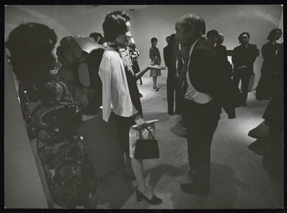 Installation view of "Isamu Noguchi," Minami Gallery, with Noguchi and visitors