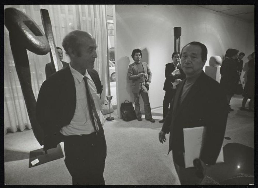 Noguchi and Taro Okamoto at opening of "Isamu Noguchi," Minami Gallery 