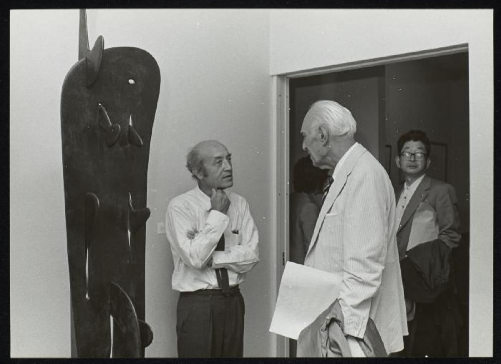 Isamu Noguchi at opening for "Isamu Noguchi," Minami Gallery