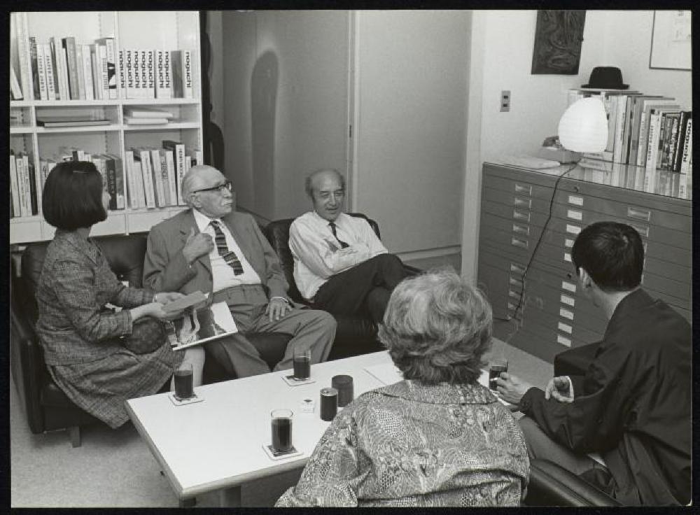 Isamu Noguchi with Mihoko Okamura, Bernard Leach and Janet Leach at "Isamu Noguchi" opening, Minami Gallery