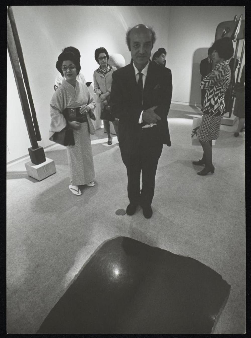 Isamu Noguchi at opening for "Isamu Noguchi," Minami Gallery 
