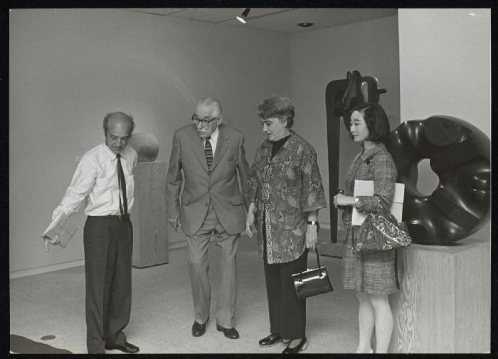 Isamu Noguchi with Bernard Leach, Janet Leach and Mihoko Okamura at "Isamu Noguchi" opening, Minami Gallery