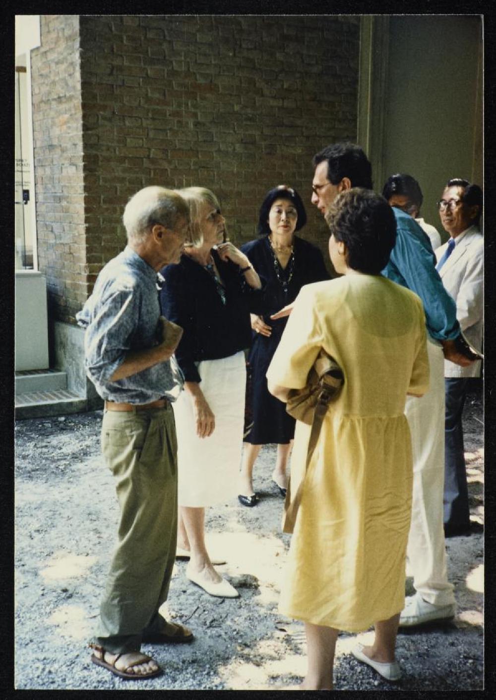 Isamu Noguchi with Priscilla Morgan, Arne Glimcher, and others at "Isamu Noguchi: What is Sculpture?" 1986 Venice Biennale